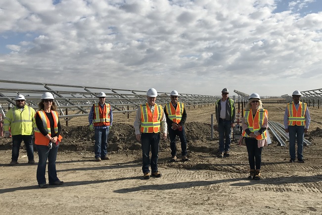 Employees at new solar energy facility